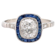 Art Deco style diamond sapphire platinum halo ring