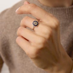 Art Deco style diamond sapphire platinum target engagement ring