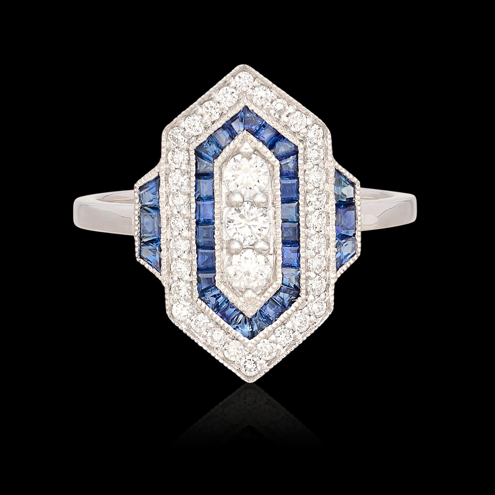 Relive the roaring 20's with this gorgeous 14k white gold ring! The geometric design features a vertical hexagon, set with 35 round brilliant-cut diamonds, G-H/VS, weighing in total 0.37 carat, and 30 calibre-cut sapphires, weighing 0.62 carat. The