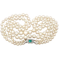 Doppelreihige Perlenkette mit Verschluss aus Weißgold und Diamanten