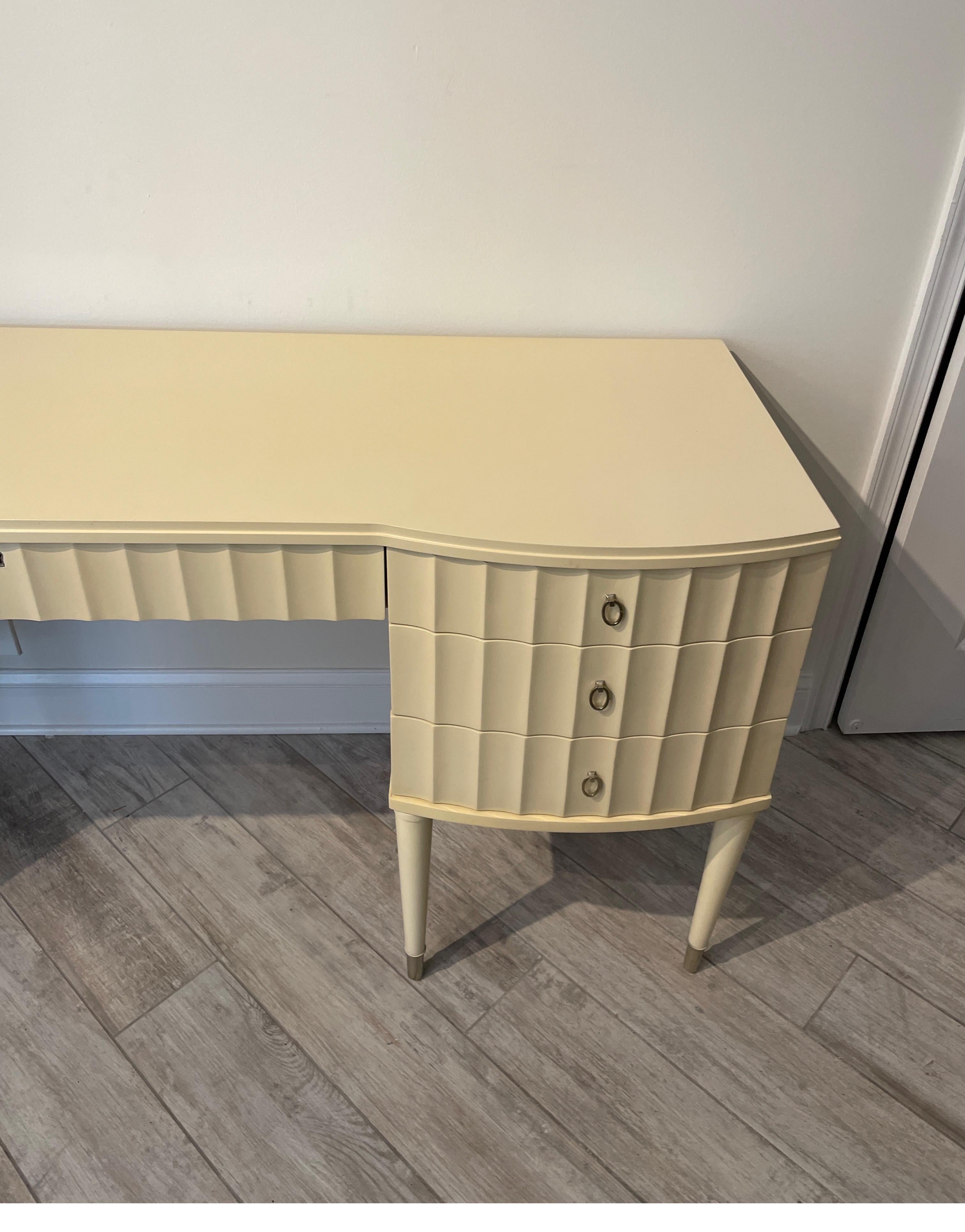 Chic cream-colored art deco style dressing table / vanity by Barbara Barry for Henredon. This glamorous piece will make you and your room feel special.