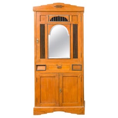 Armoire coloniale hollandaise de style Art Déco avec portes, tiroirs et façade en miroir