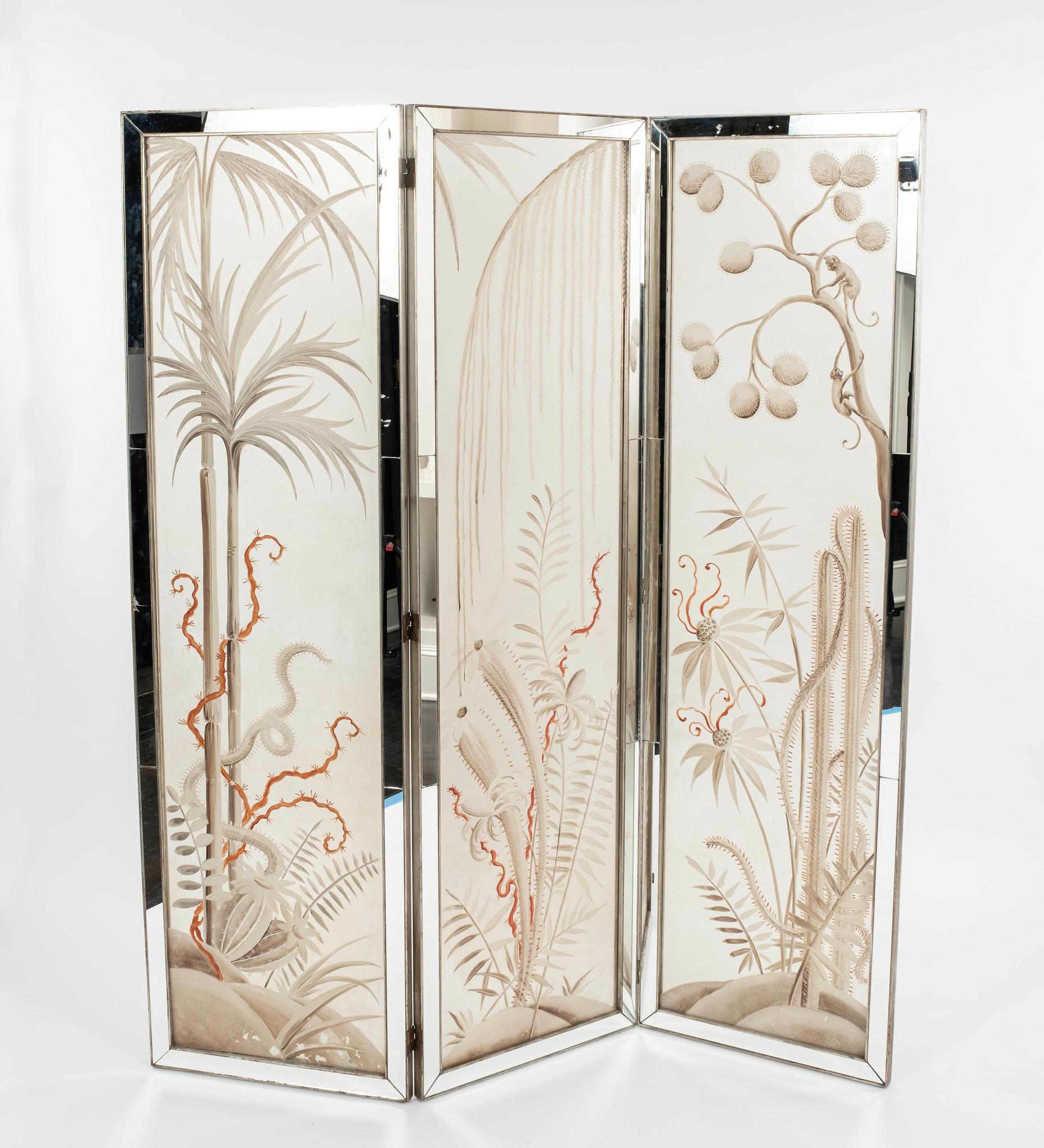 Three panel eglomise Art Deco style silver giltwood screen: frosted glass has reverse hand painted fauna and foliage in soft coral and sepia tones framed with long mirror tiles. Lovely vintage condition.

Each panel is 20