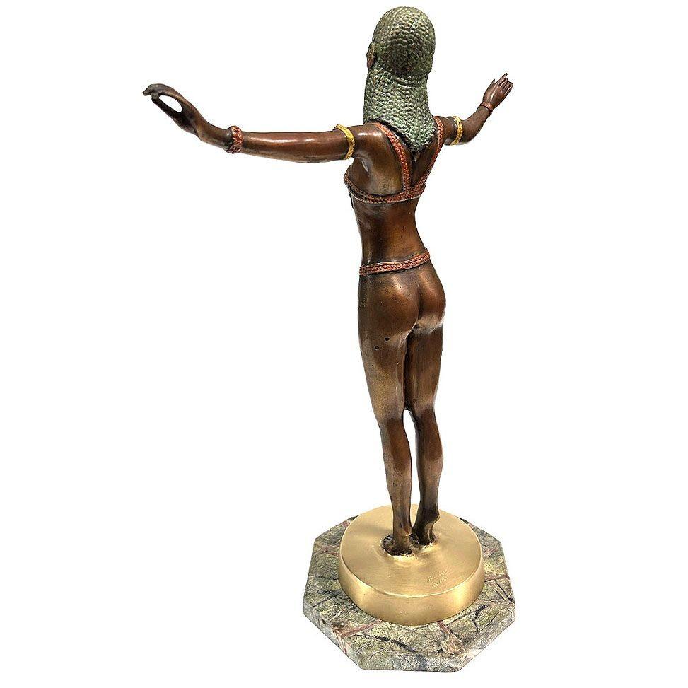 Art Deco Style Egyptian belly dancer bronze sculpture on a green marble base. The statue is fashioned after the designs of D.H. Chiparus and signed 