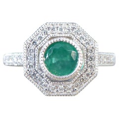 Art Deco Style Emerald and Diamond Halo Cluster Ring in Platinum