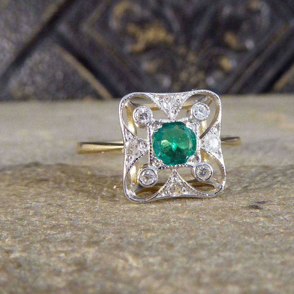 This contemporary ring has been crafted to resemble an Art Deco style with a decorative head adorned with Diamonds. It is light weight and features a single gorgeous green Emerald in the centre weighing 0.25ct surrounded by an Art Deco inspired
