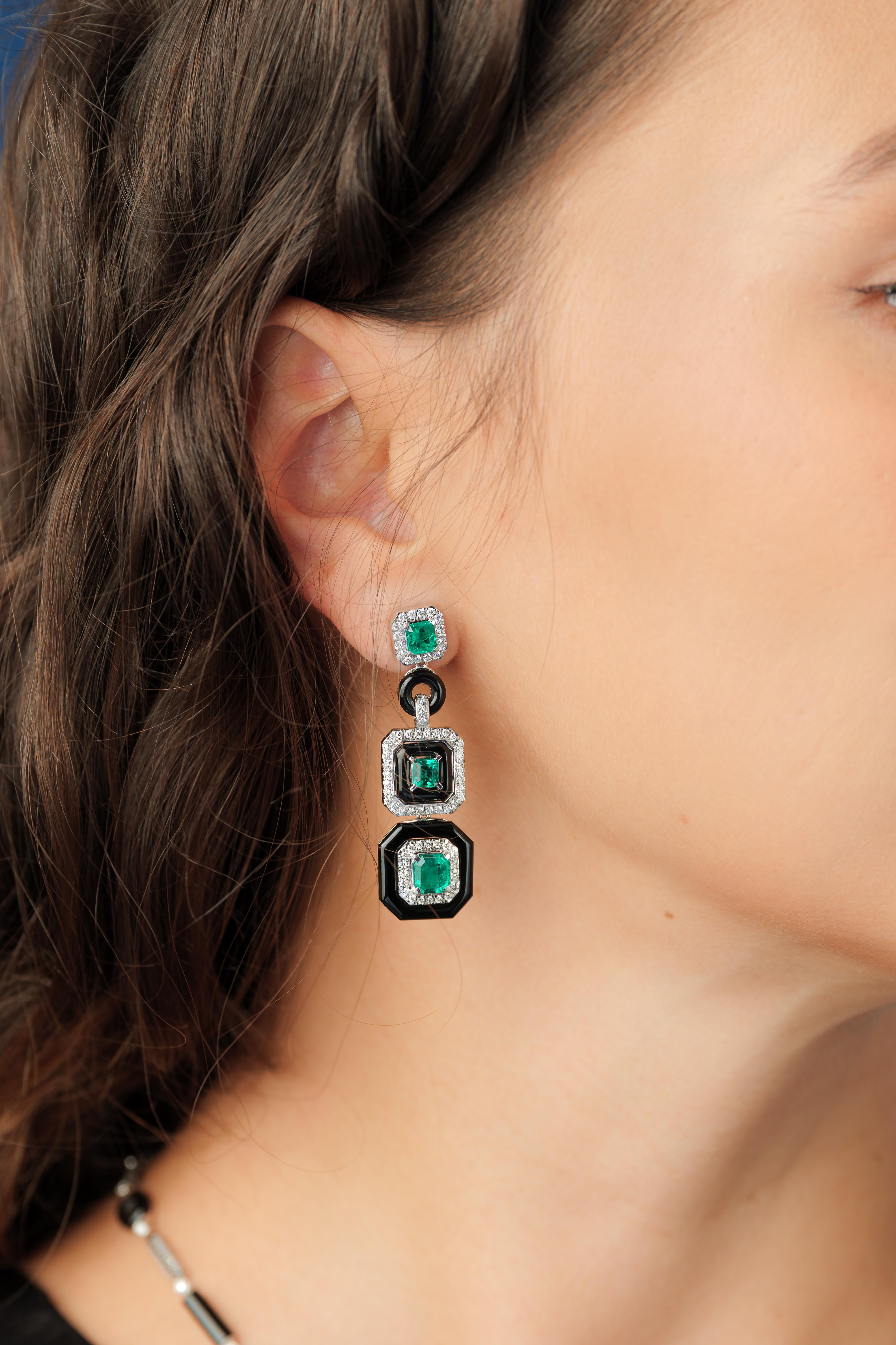 Frame earrings from our Emerald Art Deco Style Collection. These earrings are beautifully constructed with layers of diamonds and black onyx to elevate the stunning Colombian Emeralds.

Designer emerald earrings in 18K white gold and yellow gold