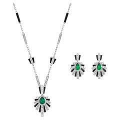 Art Deco Style Emerald, Black Onyx and Diamond Set in 18 Karat White Gold