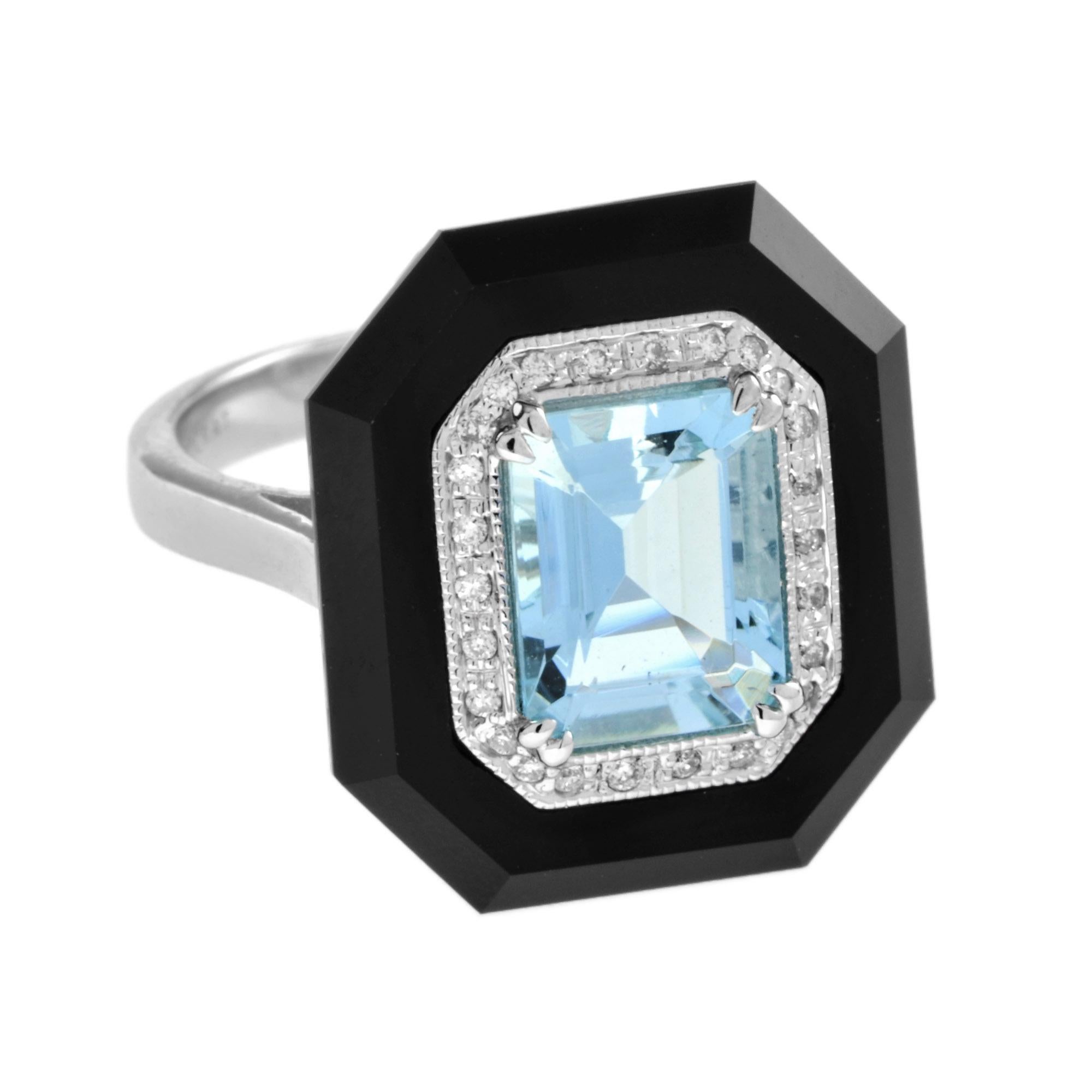 A striking and intriguing jewel, indeed. This big, bold, and colorful Art Deco style ring highlights a gorgeous emerald cut aquamarine center stone, framed in a sparkling octagonal halo of round brilliant-cut diamonds, all set off with eye-catching