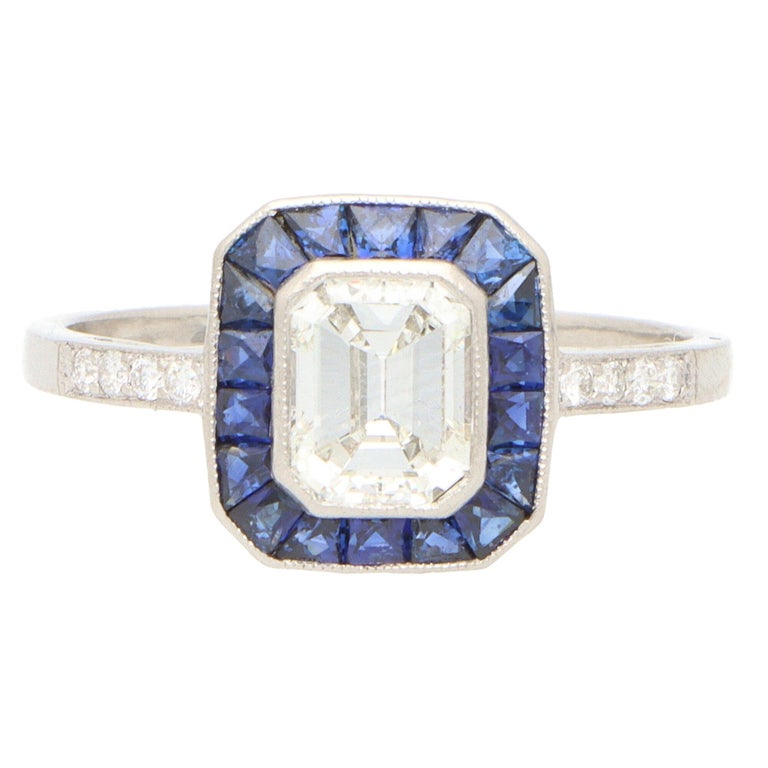 Art Deco Style Emerald Cut Diamond and Sapphire Halo Engagement Ring in Platinum For Sale