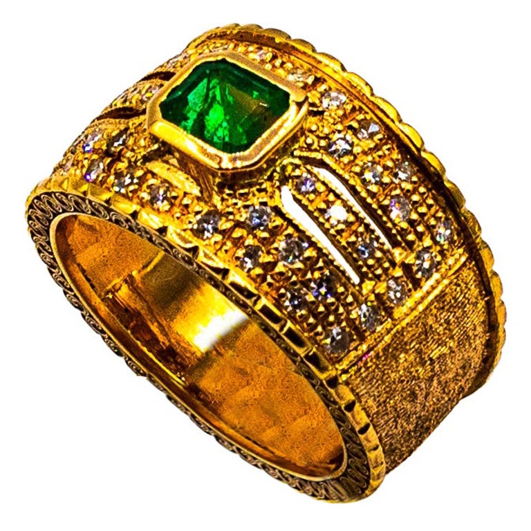 Art Deco Style Emerald Cut Emerald White Diamond Yellow Gold Cocktail Ring For Sale