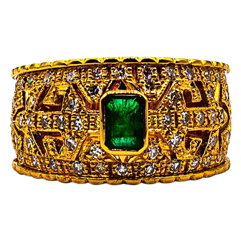 Art Deco Style Emerald Cut Emerald White Diamond Yellow Gold Cocktail Ring For Sale