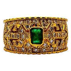 Art Deco Style Emerald Cut Emerald White Diamond Yellow Gold Cocktail Ring