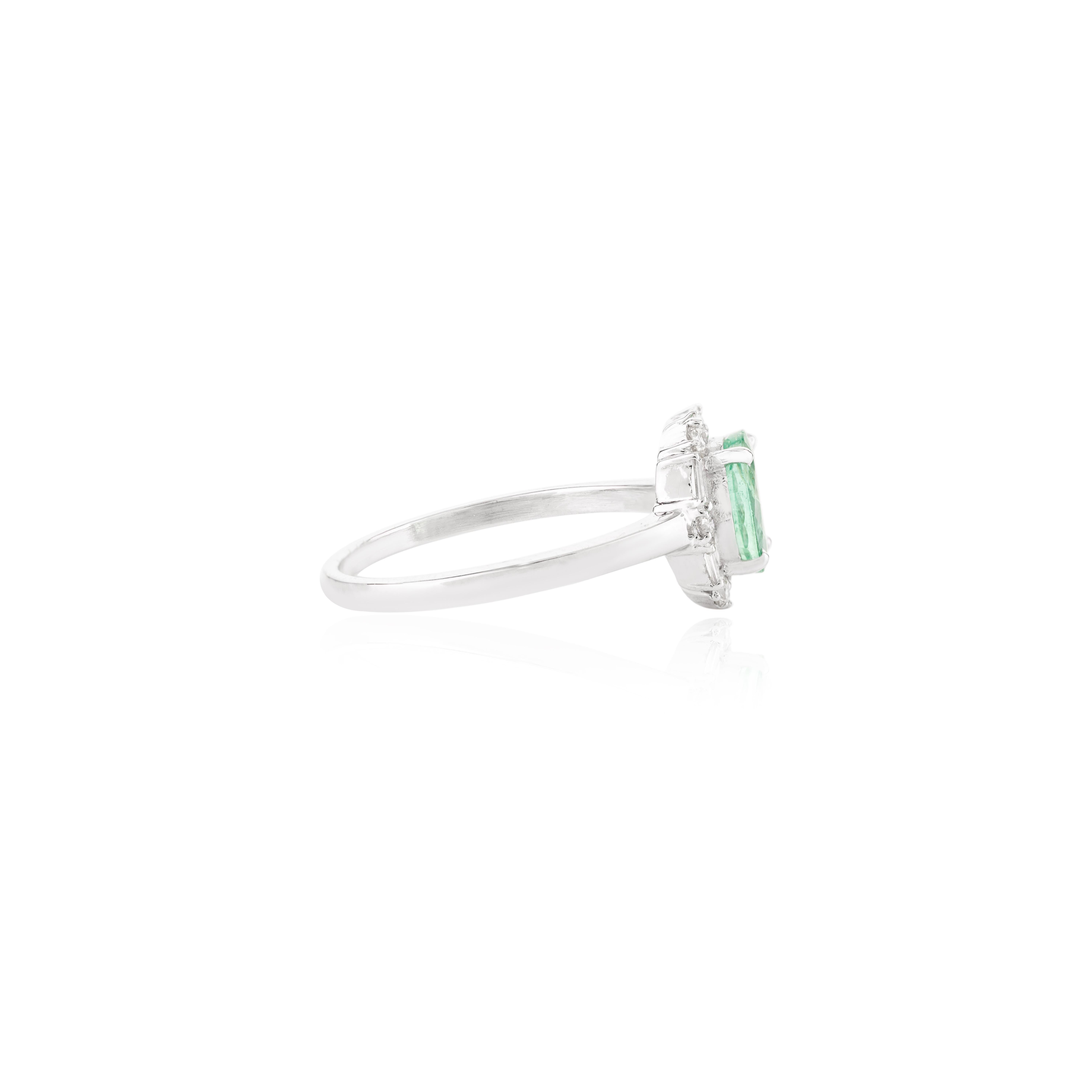 For Sale:  0.73 Carat Oval Emerald Engagement Ring with Halo Diamonds in 14k White Gold 5
