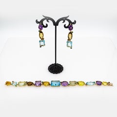 Gelbgoldarmband im Art-déco-Stil mit Smaragd, Rubin, Saphir, Topas, Citrin, Amethyst und Amethyst