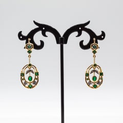 Pendientes de palanca de oro amarillo con diamante talla redonda blanco esmeralda estilo art déco