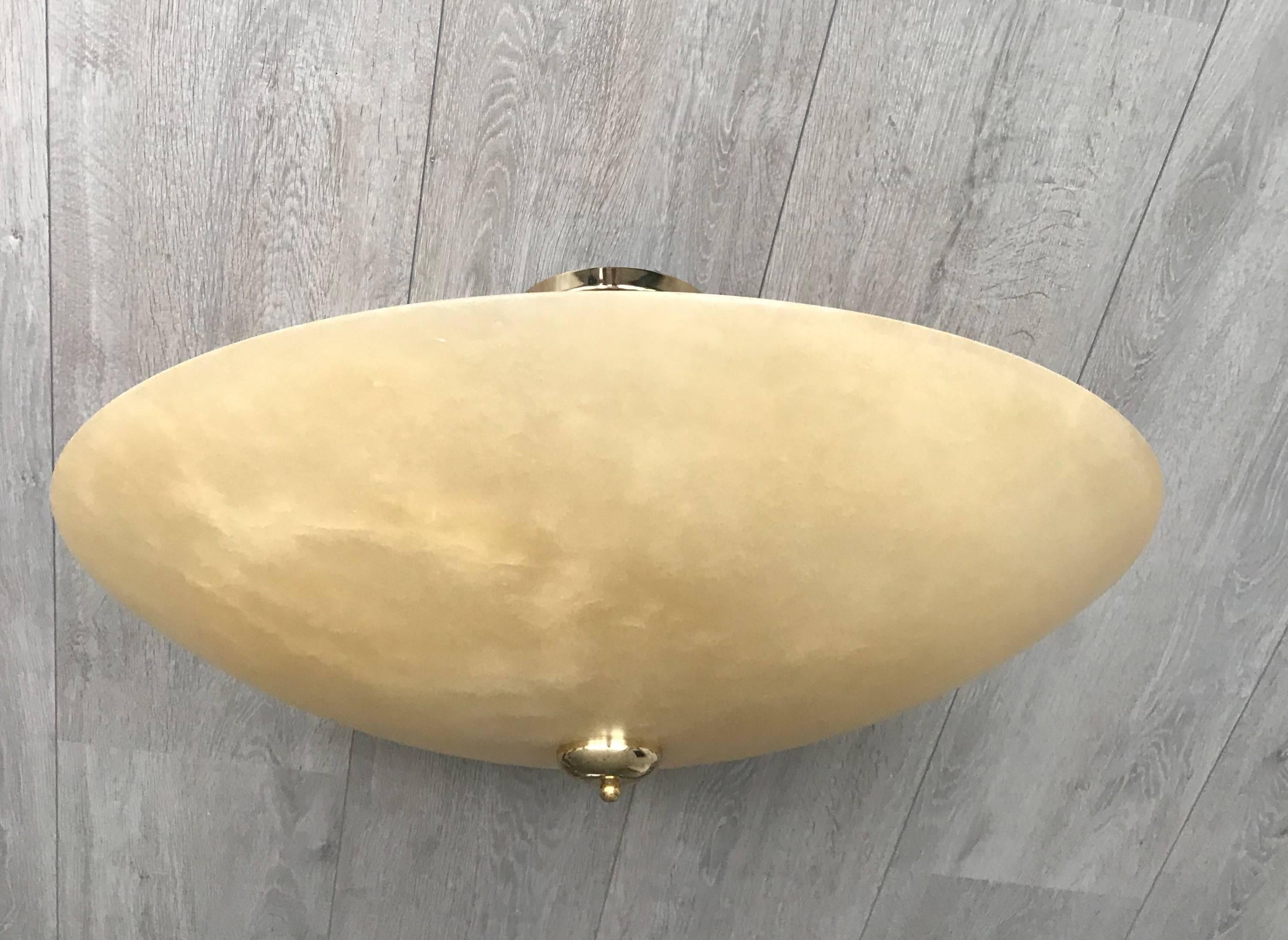 Amazing and impressive late 20th century six-light pendant. 

This rare size pendant has a beautiful look and feel and you will hardly ever find a larger alabaster shade. This extra large and impressive mineral stone shade is being held up by three