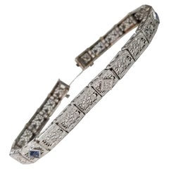 Bracelet belge filigrane de style Art déco en or 14 carats avec diamants et saphirs