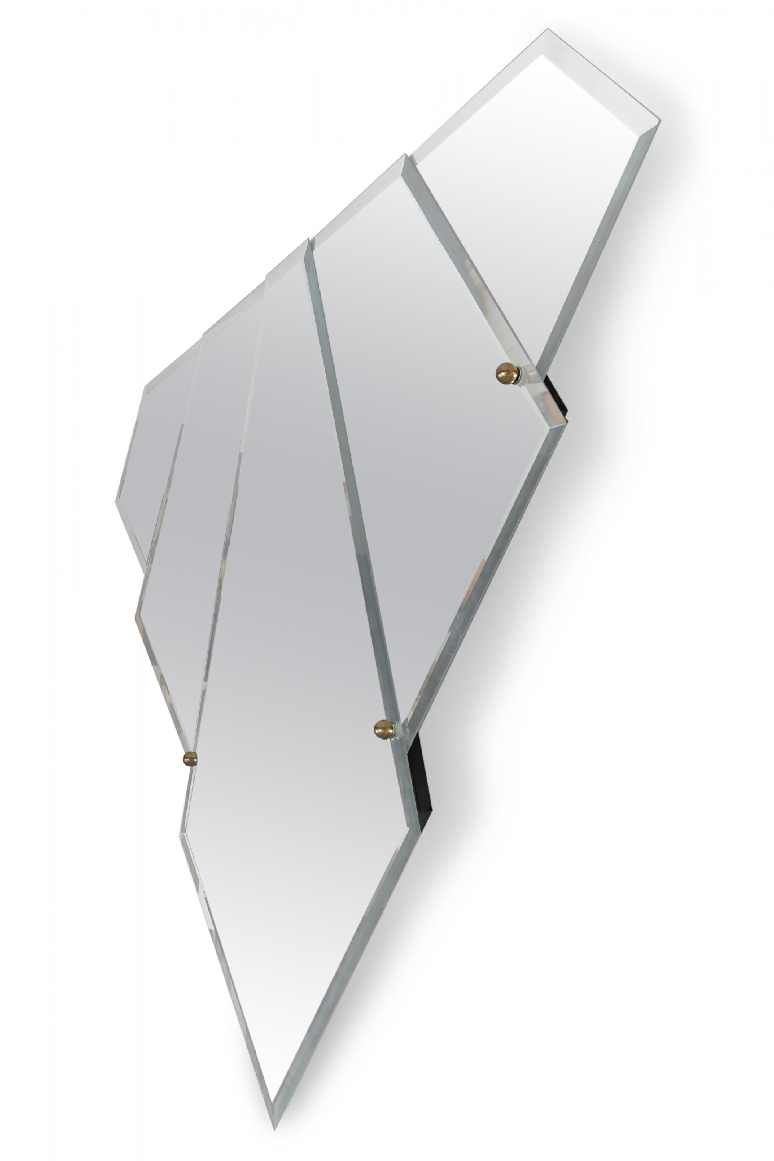 French Art Deco Style beveled glass triangular wall mirror in skyscraper form mounted as a whole from five graduated segments with four brass sphere adornments at the corners.