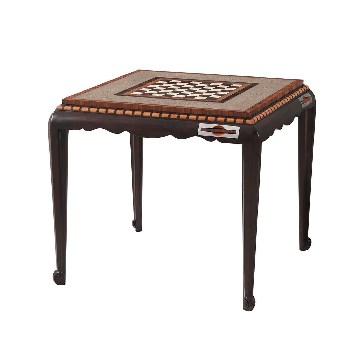 A rosewood veneered and mahogany games table, the square top with a chessboard inlay within a faux shagreen and rosewood cross-banded border, the reverse with a backgammon board inlay, above a quarter round checker banded molded edge above a gently