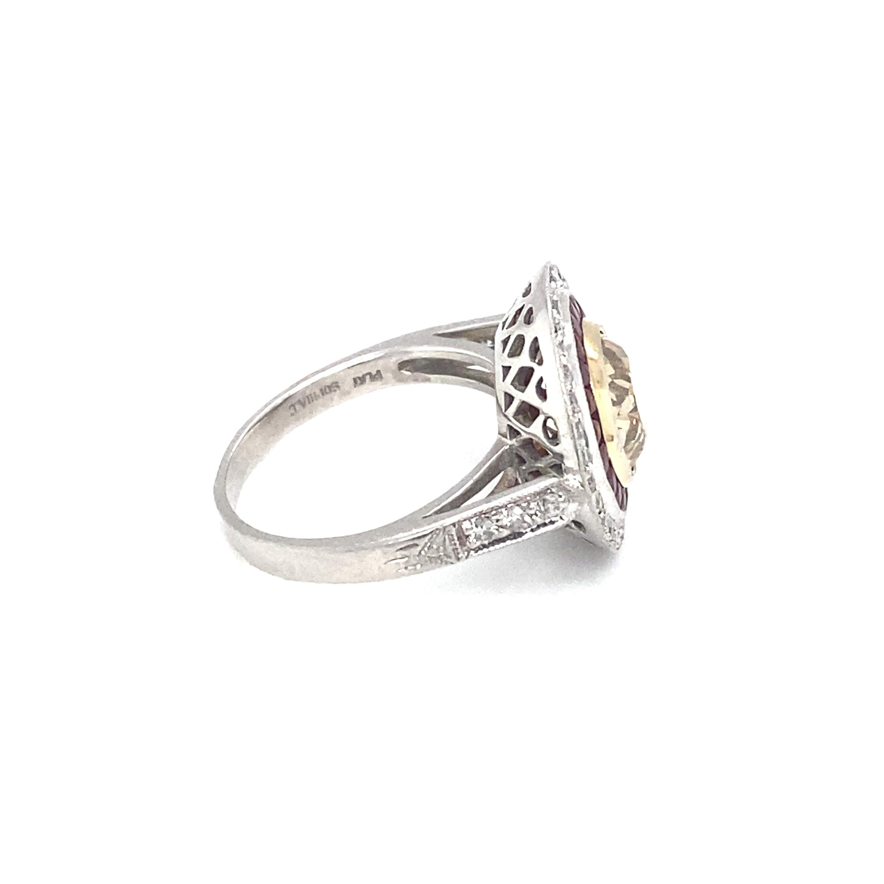 Item Details: This Art Deco style ring has a center GIA certified brown diamond with accent colorless diamonds and rubies. It's a beautiful piece for any vintage loving bride! Signed Sophia D.

Circa: 2000s
Metal Type: Platinum
Weight: 8.3g
Size: US