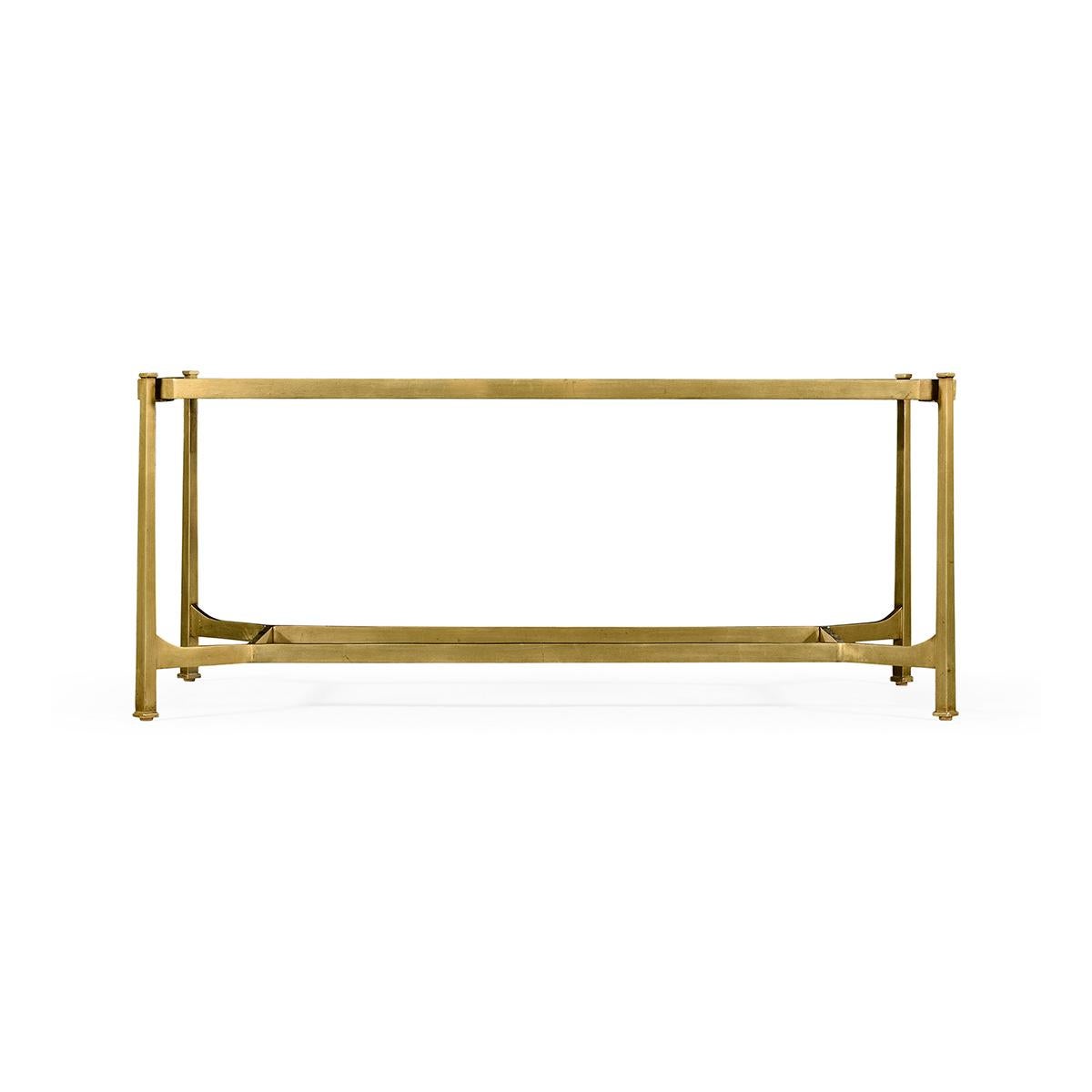 Art Deco Style Gilt cocktail table, wrought iron frame with an antique gilded finish and églomisé rectangular top set on an openwork stretcher base. 

Dimensions: 48