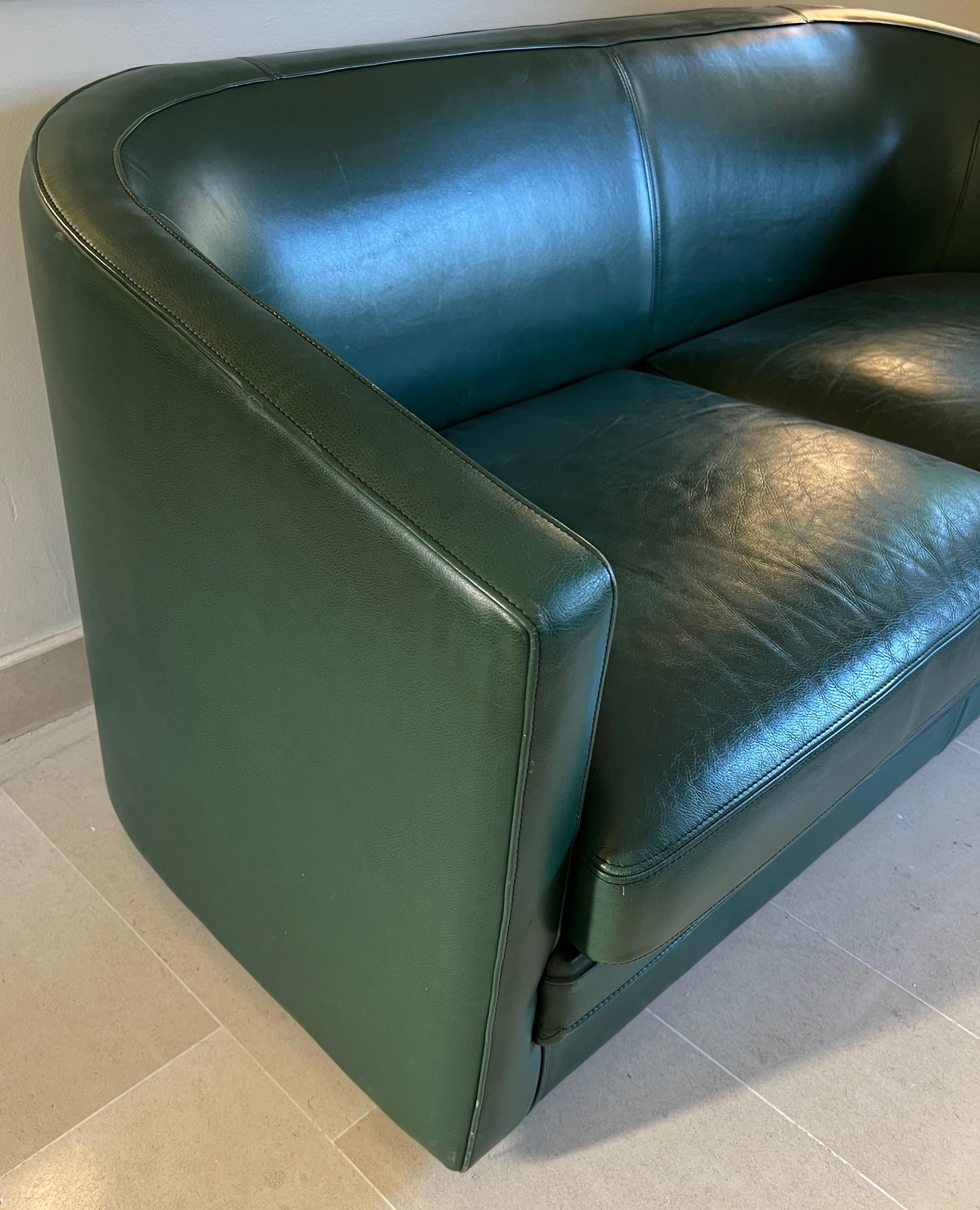 green leather sofa vintage