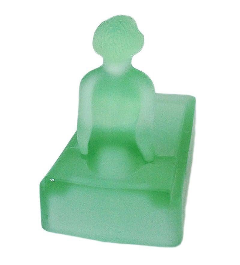 This 1970s re-edition of a 1927 Art Deco Heinrich Hoffman frosted green art glass soap dish/ring tray features a nude female figure bathing in a tub.

Condition: Excellent.

Measures: Specifications: Height 2.75, width 6, depth