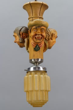 Art Deco Style Hand-Carved Wooden and Crackle Glass Pendant Light Three Men