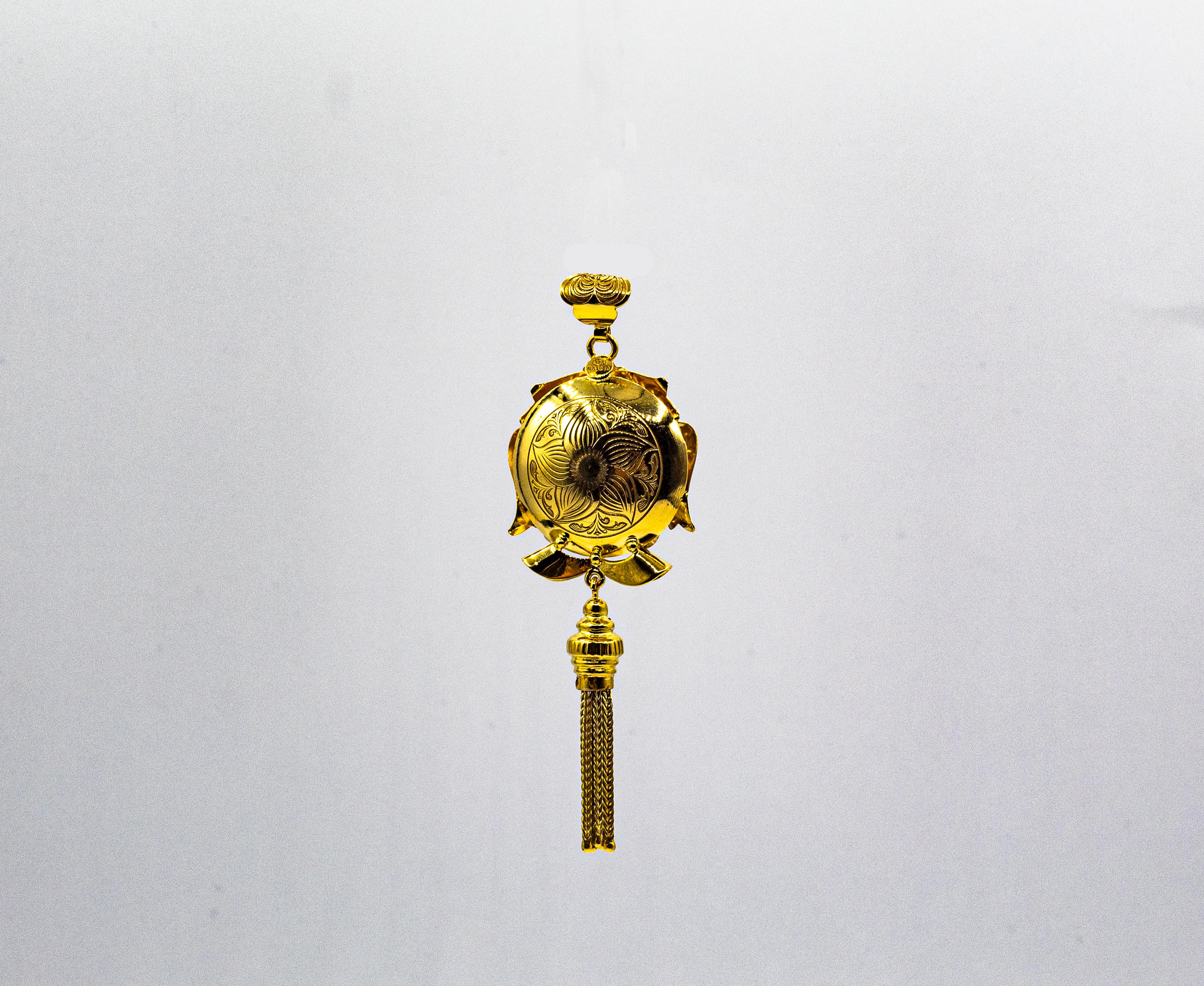 Collier pendentif de style Art déco en or jaune avec topaze bleue et rubis, fabriqué à la main en vente 1
