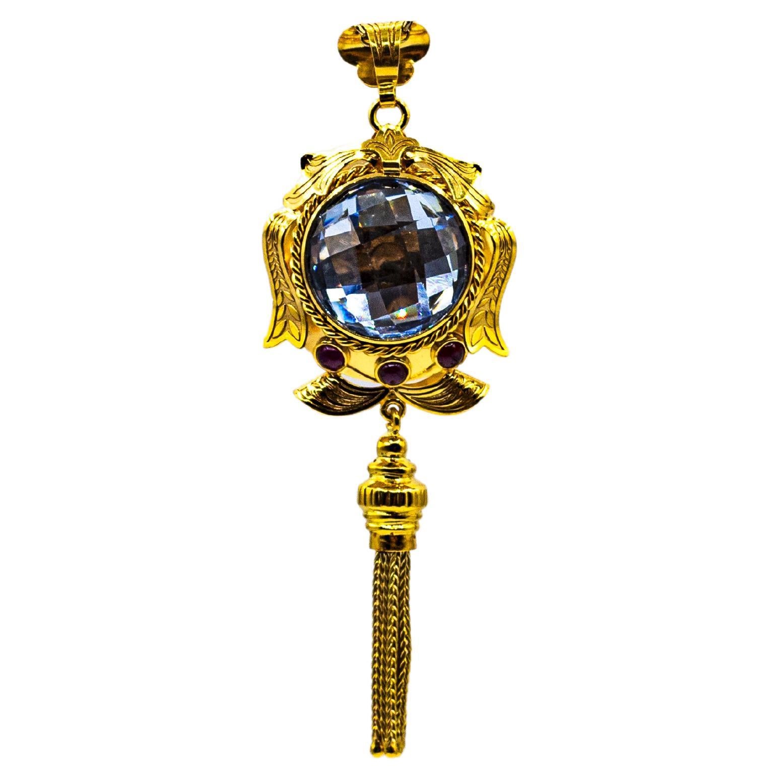 Collier pendentif de style Art déco en or jaune avec topaze bleue et rubis, fabriqué à la main