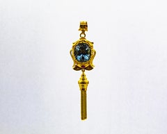 Art Deco Style Handcrafted Ruby Blue Topaz Yellow Gold Pendant Necklace