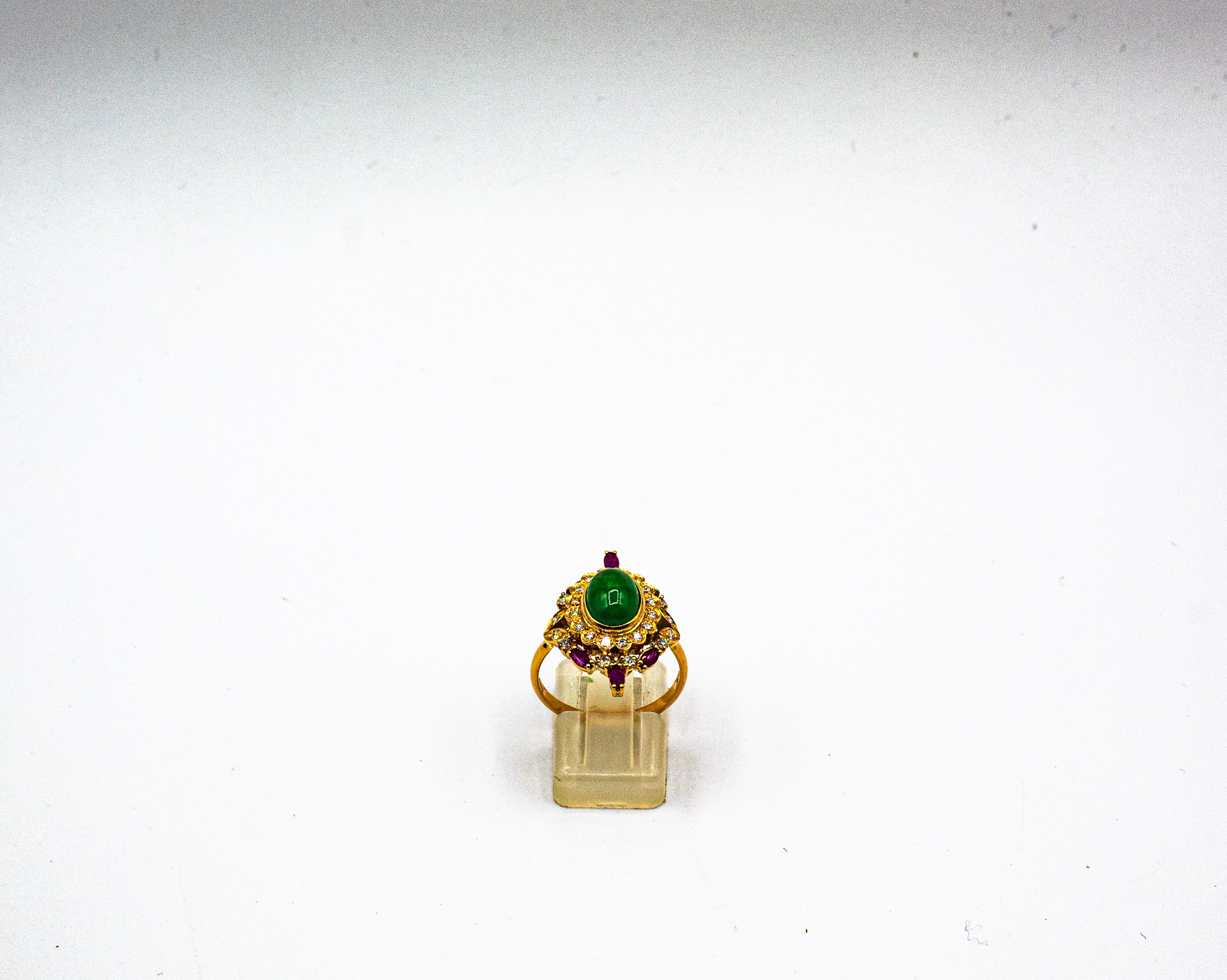 This Ring is made of 9K Yellow Gold.
This Ring has 0.45 Carats of White Brilliant Cut Diamonds.
This Ring has a 2.10 Carats Cabochon Cut Emerald.
This Ring has 0.60 Carats of Marquise Cut Rubies.

This Ring is available also in 14 or 18K Yellow or