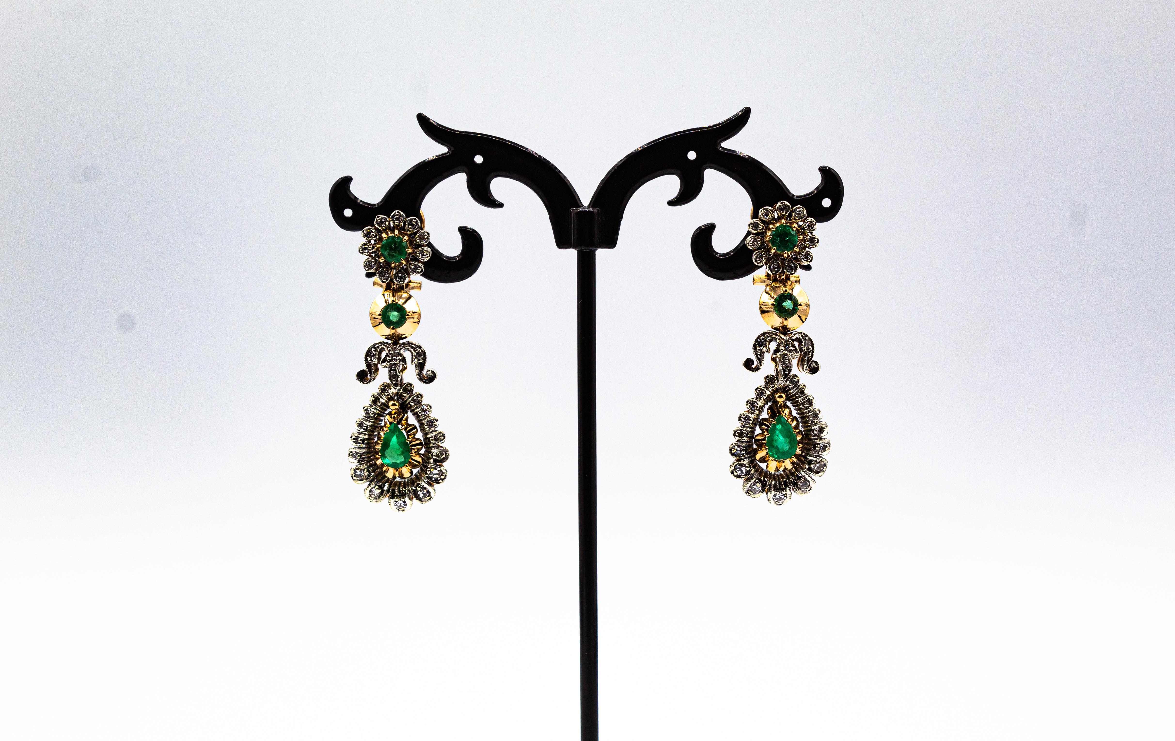These Clip-On Earrings are made of 9K Yellow Gold and Sterling Silver.
These Earrings have 0.70 Carats of White Modern Round Cut Diamonds.
These Earrings have also 1.80 Carat of Modern Round Cut and Pear Cut Emeralds.

These Earrings are available