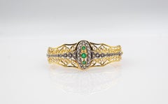Pulsera de oro amarillo esmeralda con diamantes talla rosa blanca de estilo art déco hecha a mano