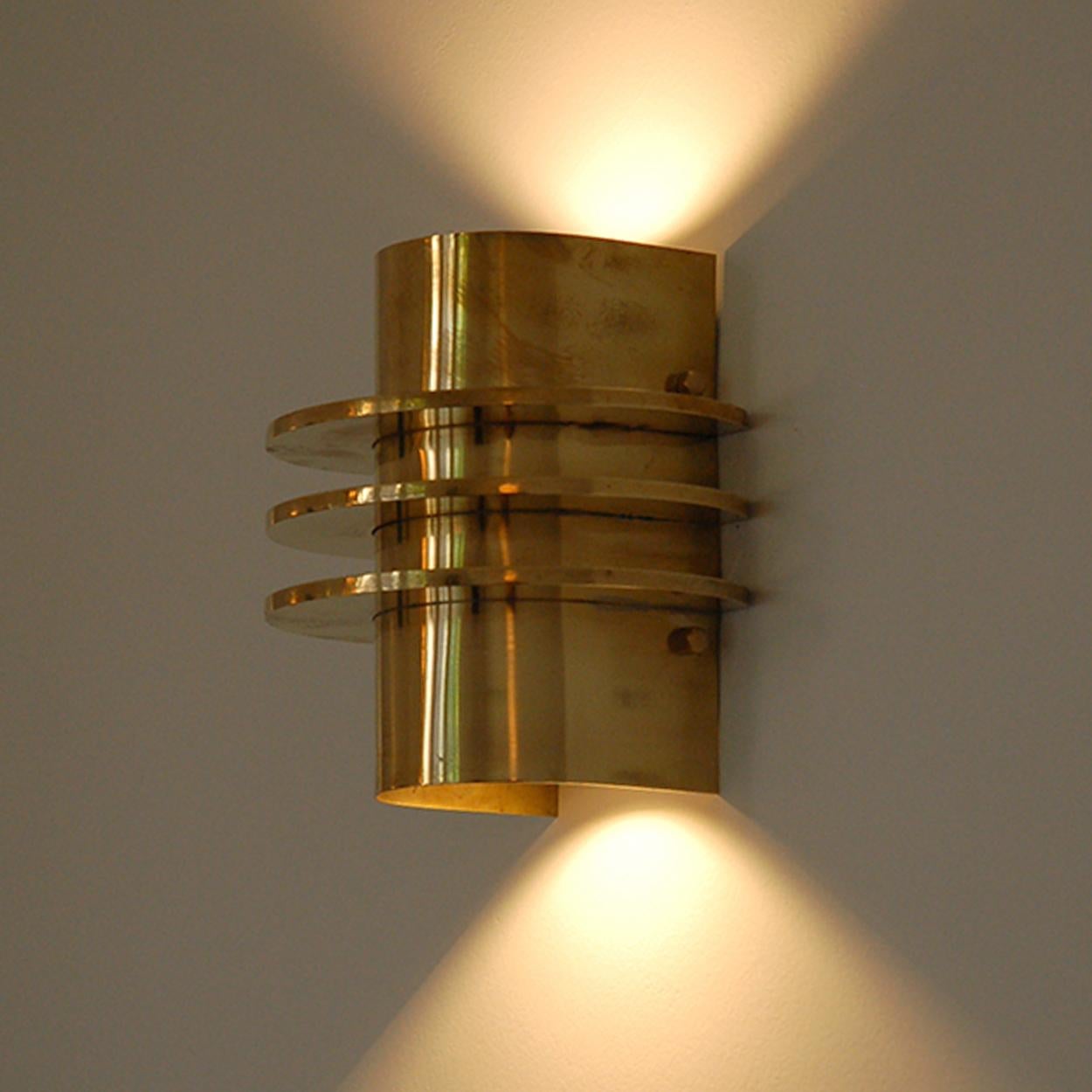 Wall light Amsterdam School-style (1920). These wall lights is executed with nickel ornaments and led-lights, to compliment the Cascade in your stairwell. The finish of the lamp testifies to extremely good craftsmanship.

When interested we can also
