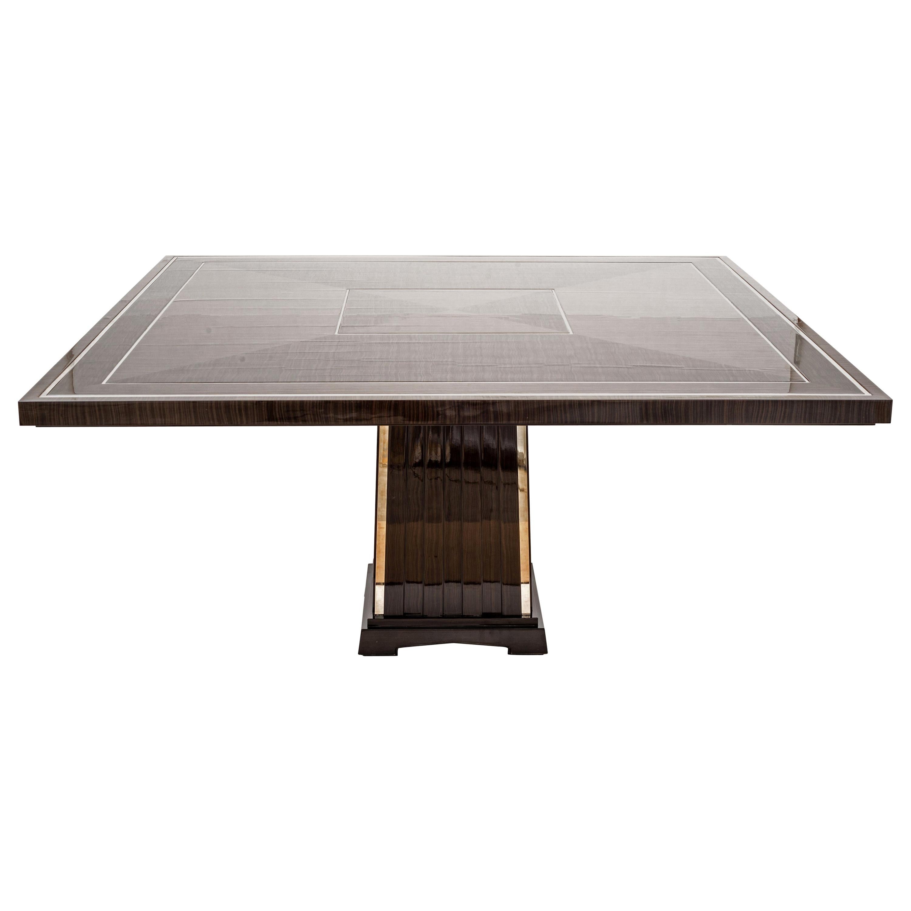 Importante table de salle à manger de style Art Déco, plateau en bois de placage et inserts chromés