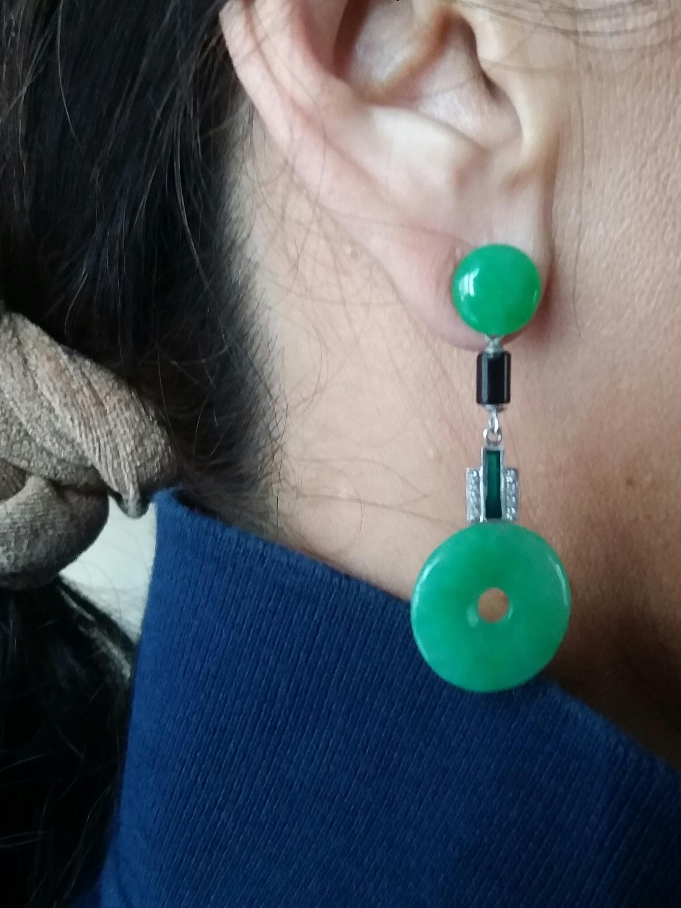 these earrings have at the top 2 jade buttons, then a central part with 2 small cylinders of black onyx and 2 elements in gold diamonds and green enamel, the bottom is composed of 2  Jade discs
In 1978 our workshop started in Italy to make