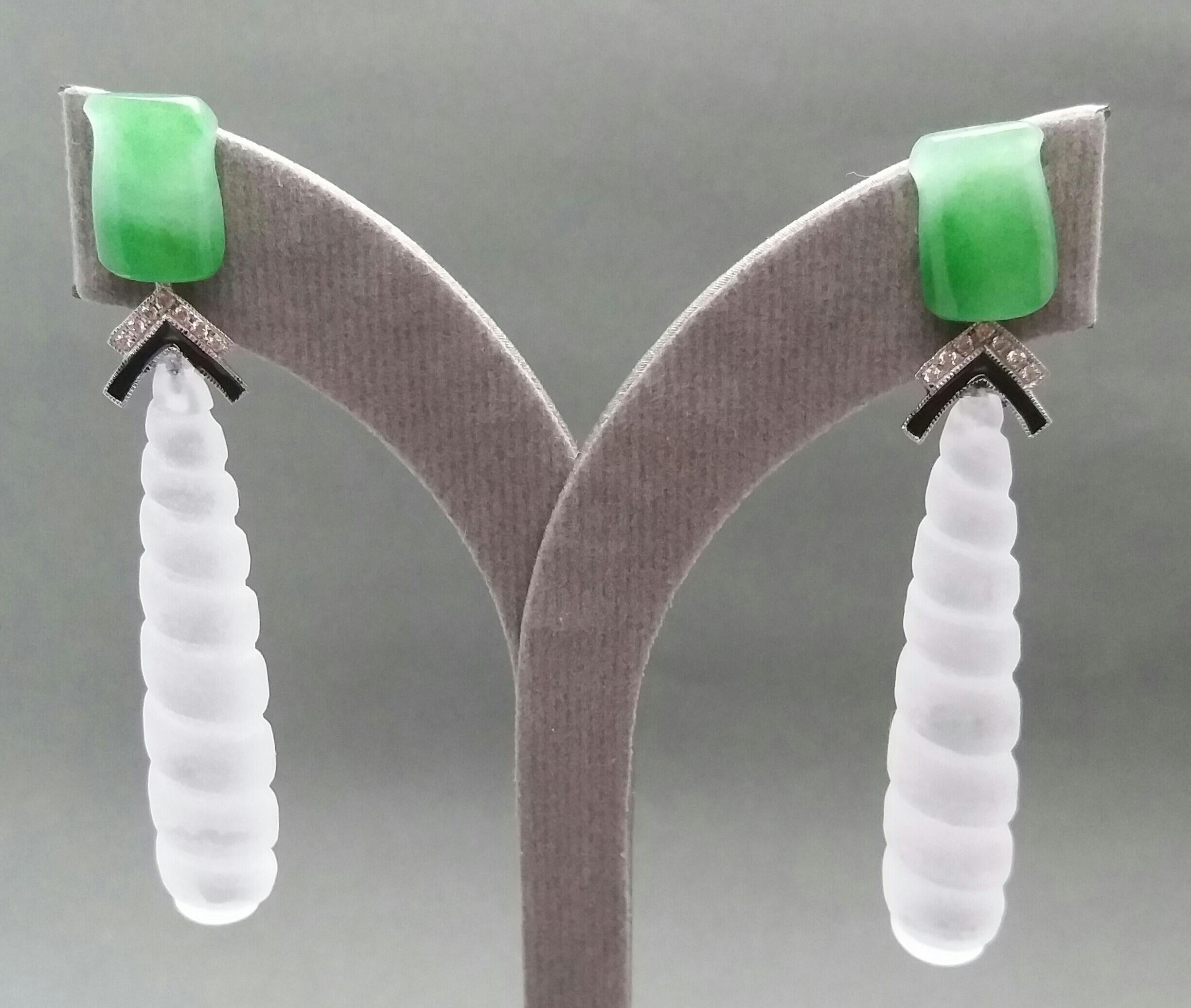 2 Bamboo style carved Jades  are on top, middle parts in white gold ,16 round full cut diamonds,black enamel,2  Rock Crystal  twisted style engraved drops  50 mm long

In 1978 our workshop started in Italy to make simple-chic Art Deco style