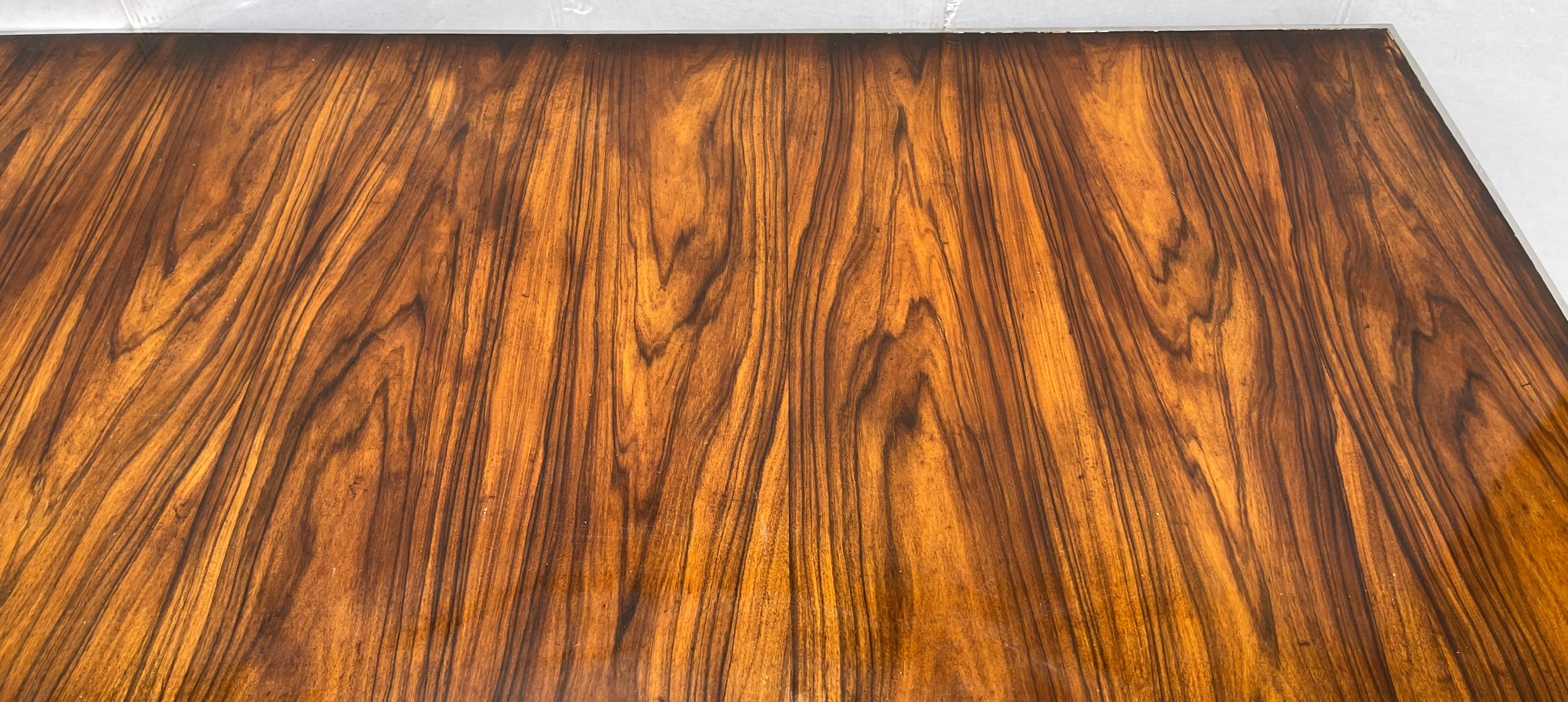 This is a show stopper! This is an Art Deco style kingwood partners desk by Theodore Alexander. Sleek, beautiful lines…photos don’t do it justice. It is marked, and from the floor to the drawer is 26.5”.