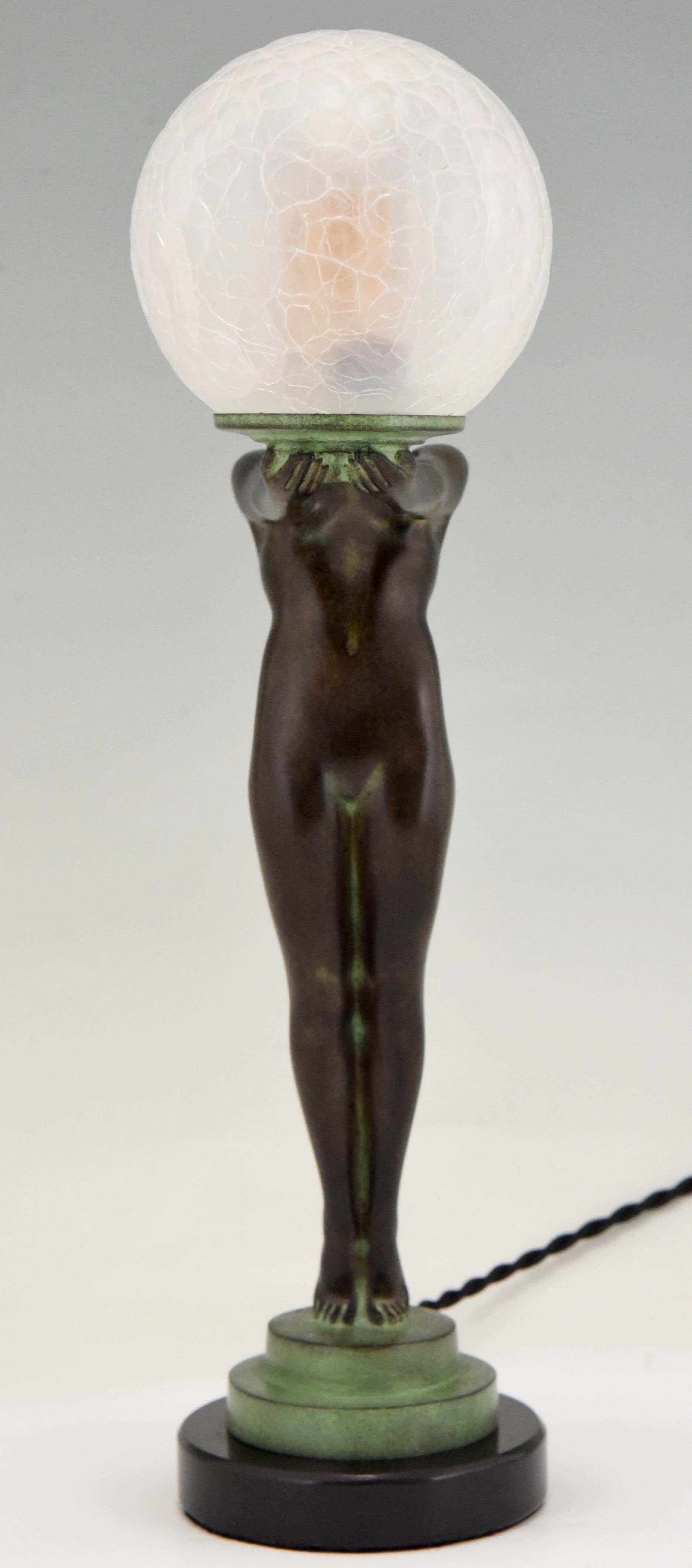 Patinated Art Deco Style Lamp CLARTE Standing Nude Holding a Glass Shade Max Le Verrier 