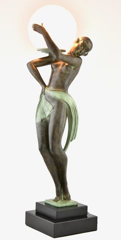 Art Deco style lamp dancer with ball  FARANDOLE by Fayral & Max Le Verrier