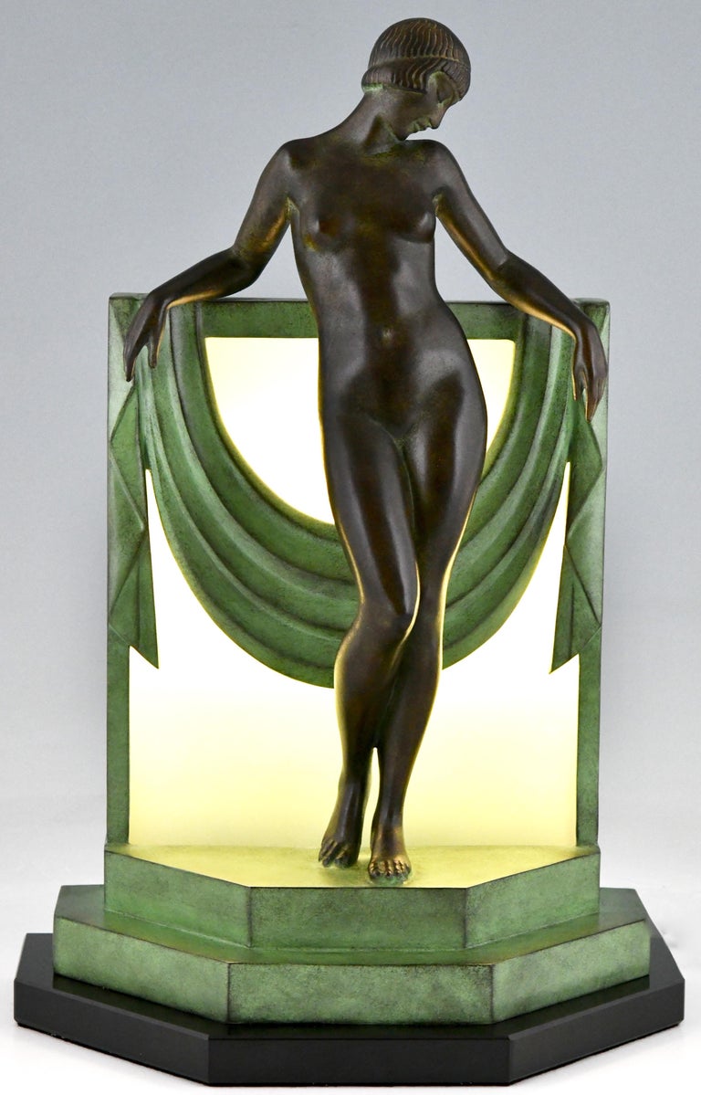 Sérénité, ?Art Deco lamp sculpture nude with scarf. 
Designed by ?Fayral, pseudonym of Pierre Le Faguays.?
This lamp was cast at the Max Le Verrier foundry.