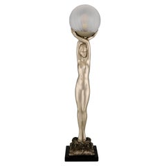 Lampe im Art-déco-Stil, Nude mit Globus, Pierre Le Faguays
