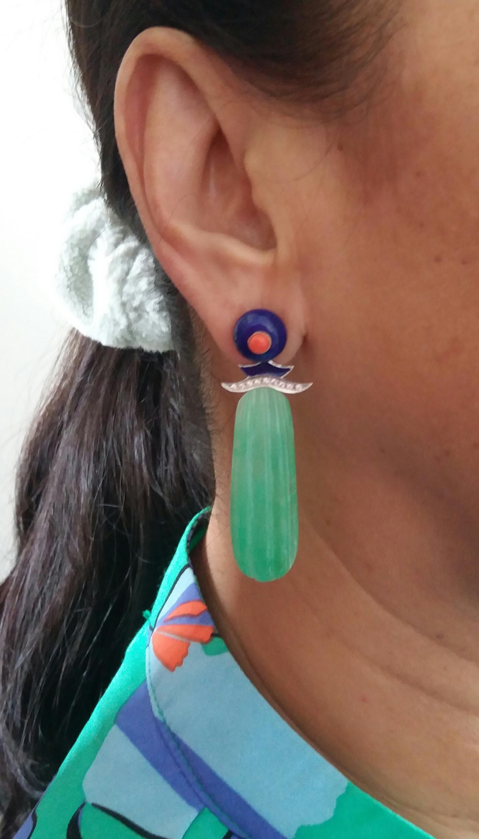 Classic Art Deco style Earrings,the tops in natural  Lapislazuli  buttons with 2 small round Coral cabochons in the center.The middle parts are in white gold , 18 round full cut diamonds and Blue Enamel..On the bottom parts we have 2 Engraved Jades