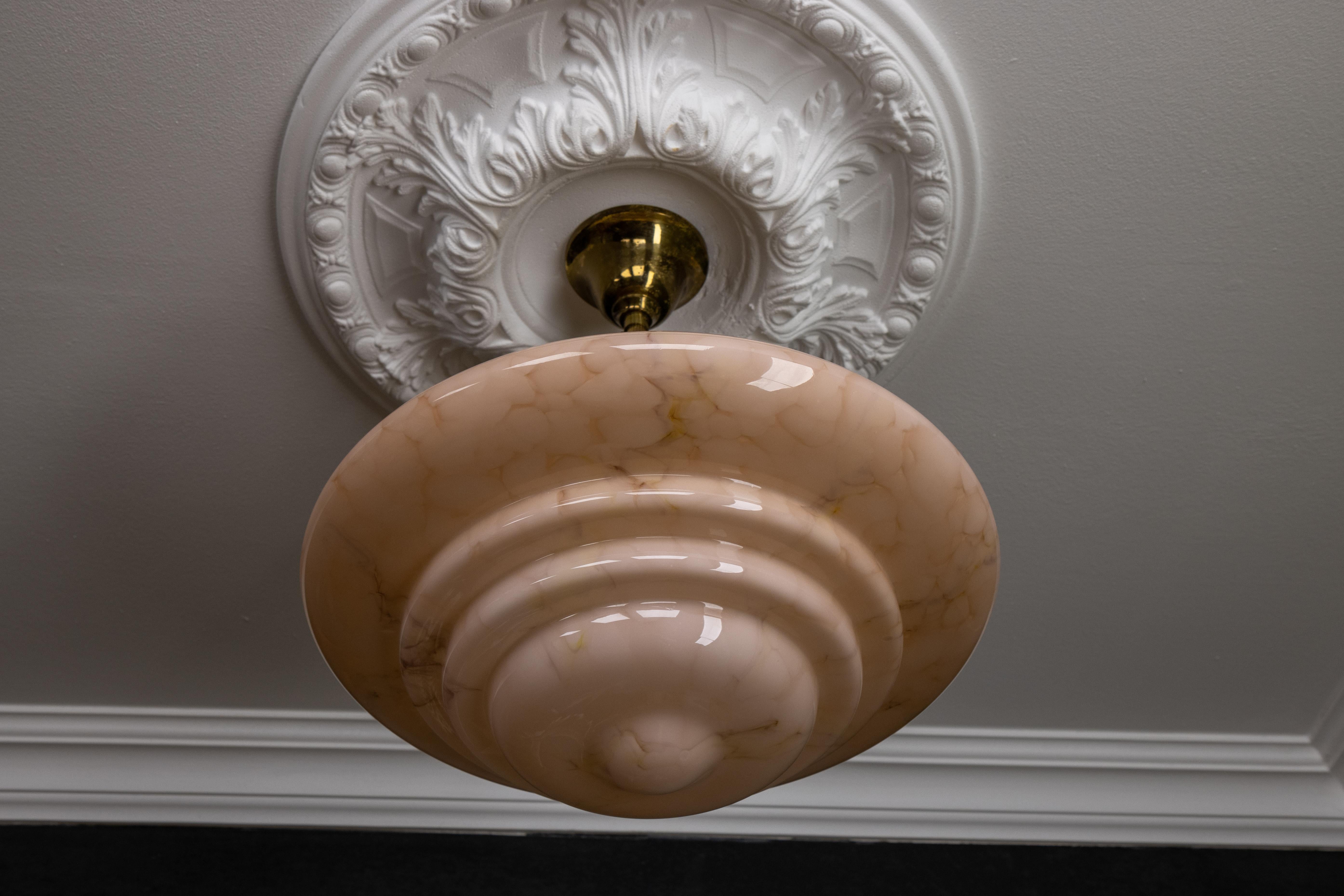 Mid-20th Century Art Deco Style Layered Marbled Beige Pink Glass and Brass Pendant Light