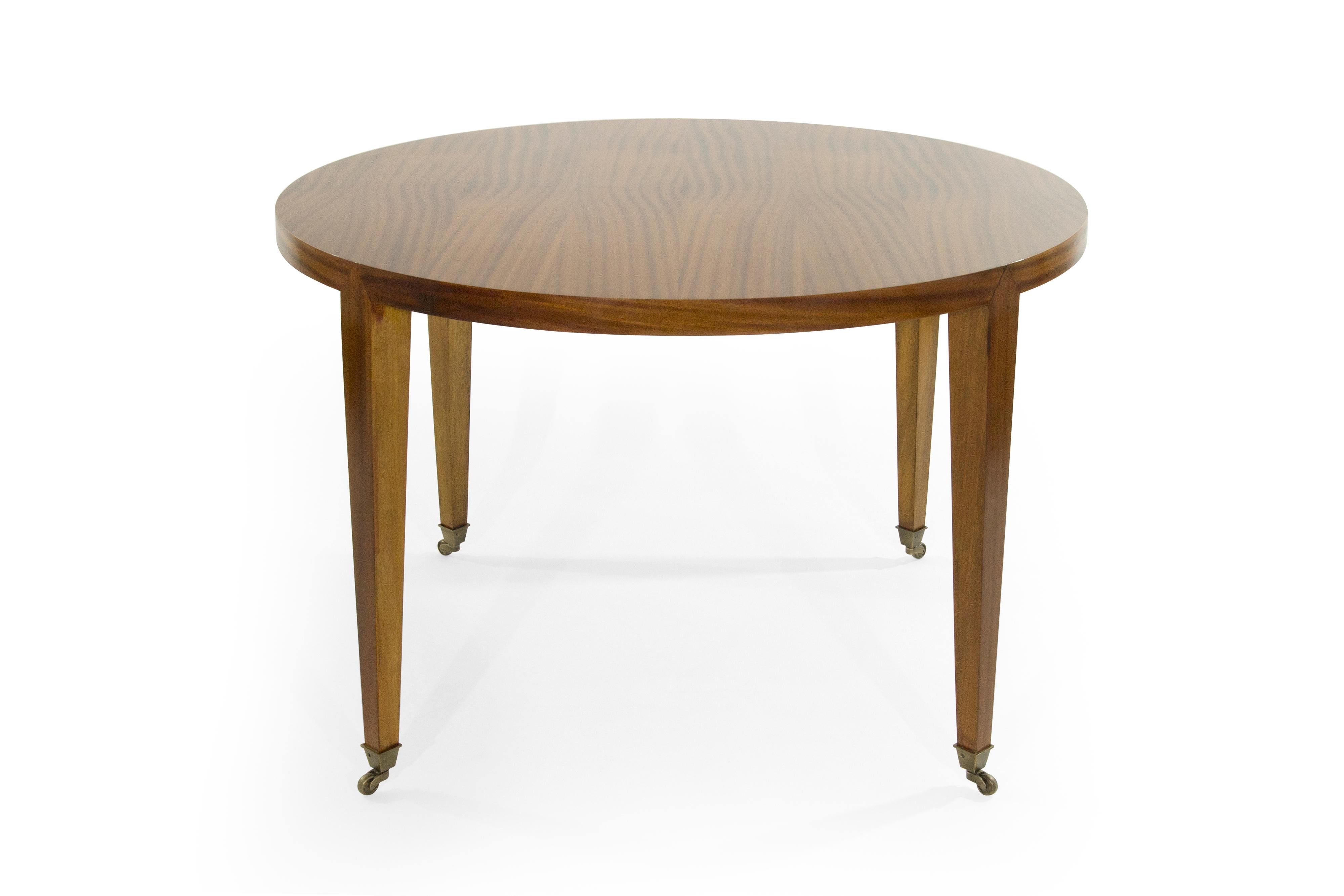 Custom games or breakfast table in the style of Danish designer Severin Hansen. 

High gloss finish over natural mahogany, fitted in casters in am antiqued brass finish.
