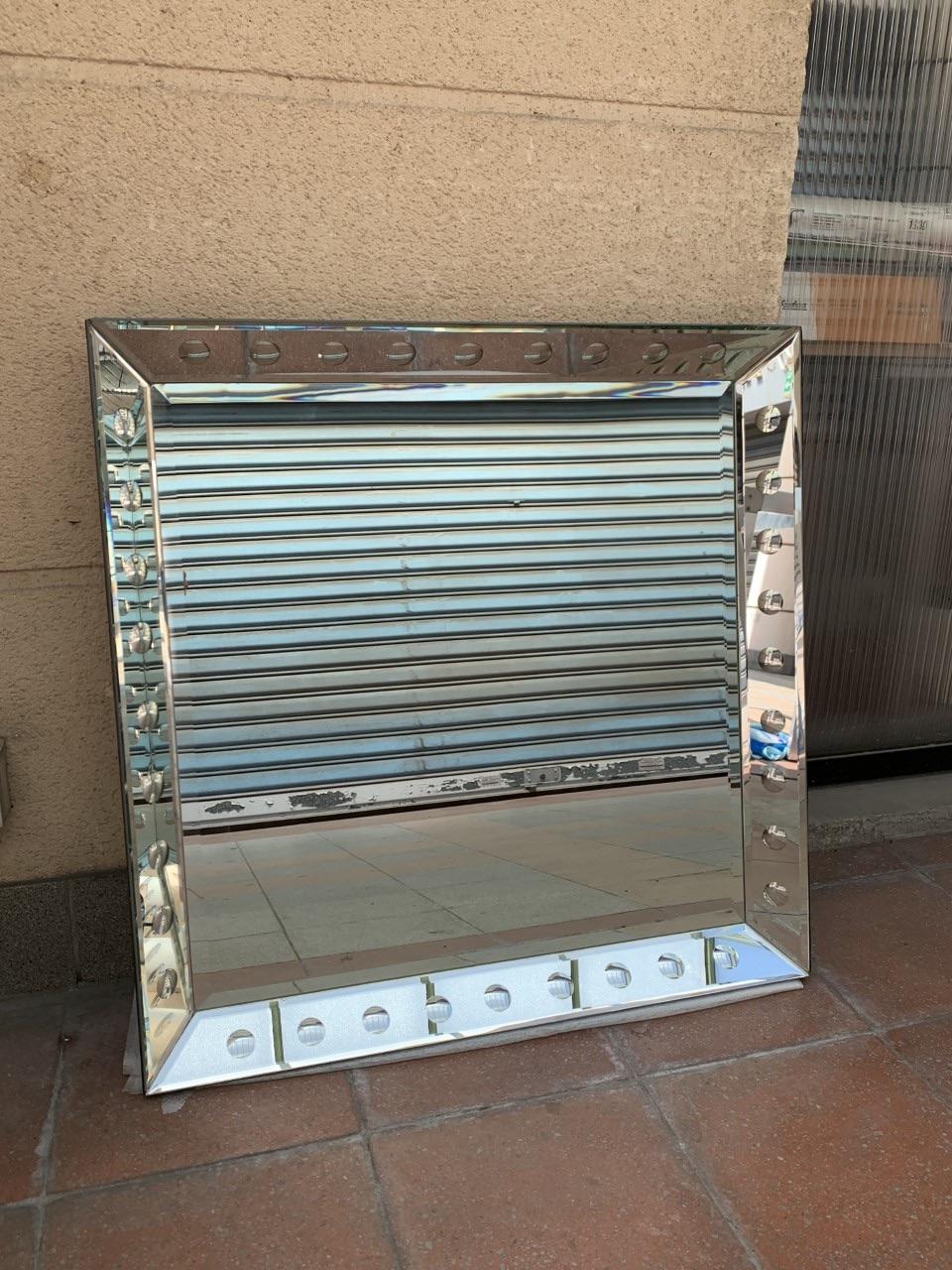 Art Deco style mirror

Art Deco style mirror 
2005 
2 available for each size, possibility to buy in pair 

Dimensions : 
		Small : 80 x 80 
		Large : 100×100
Price per unit : 
		1200€ the big one 
		 990€ the small one 