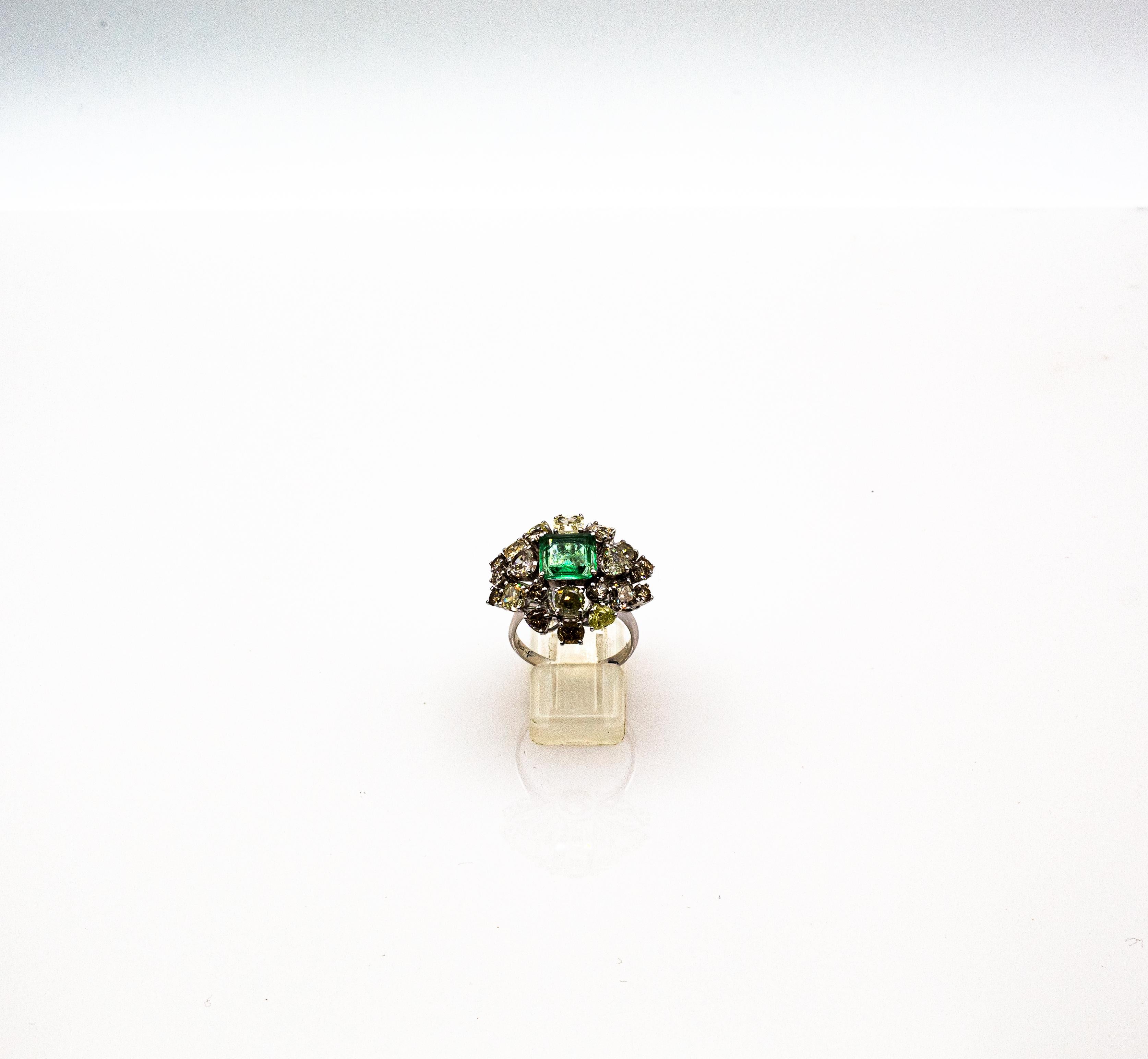 This Ring is made of 18K White Gold.
This Ring has 5.20 Carats of White, Yellow and Brown Pear Cut, Cushion Cut, Old European Cut, Oval Cut Modern Round Cut Diamonds.
This Ring has a 2.80 Carats Natural Brazil Emerald Cut Emerald.
This Ring is