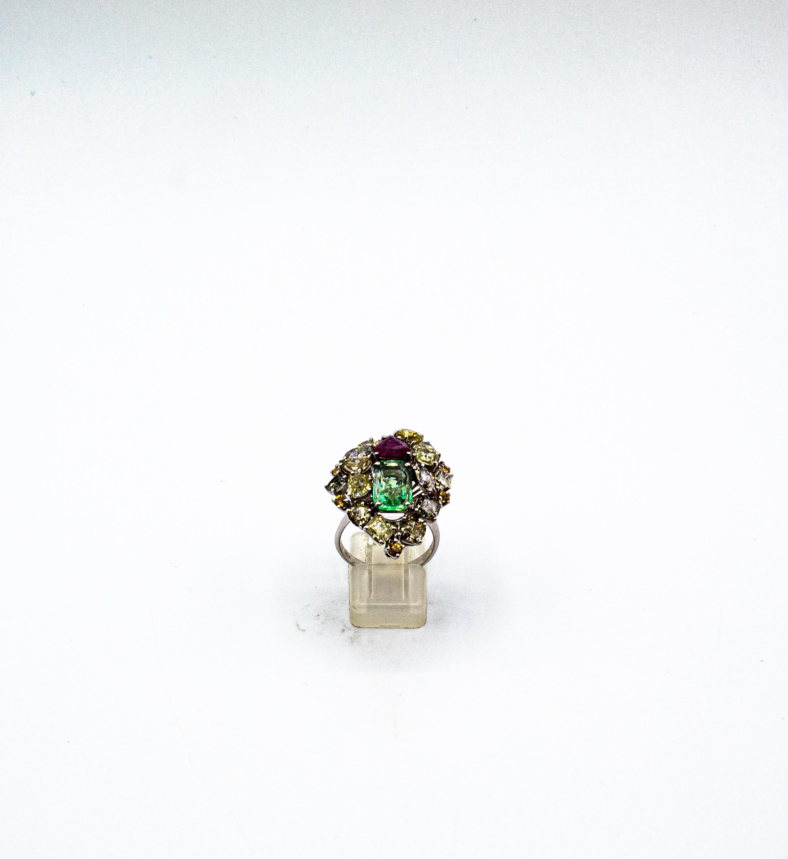 This Ring is made of 18K White Gold.
This Ring has 6.20 Carats of White, Brown and Yellow Old European Cut, Cushion Cut, Marquise Cut, Heart Cut, Pear Cut and Modern Round Cut Diamonds.
This Ring has a 2.20 Carats Natural Brazil Emerald Cut